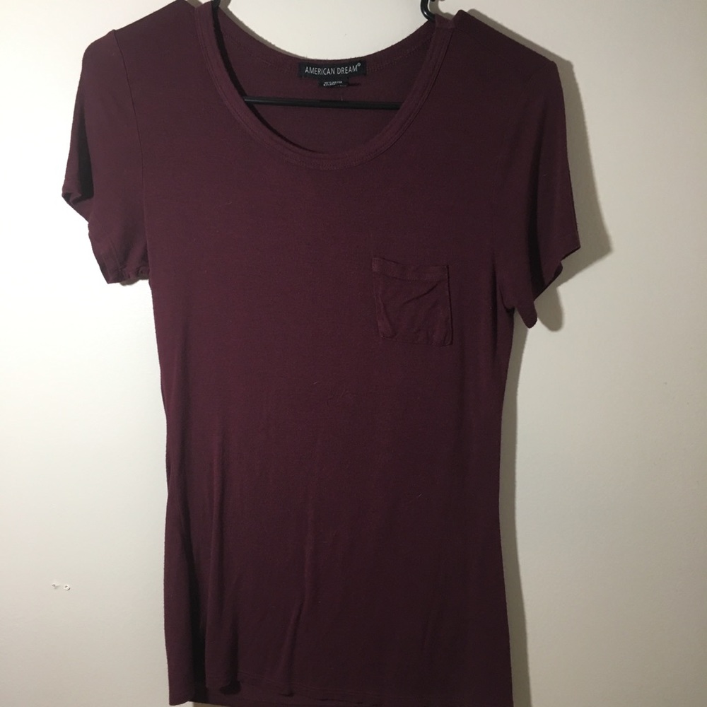 Maroon colored T-shirt. Lightly used.